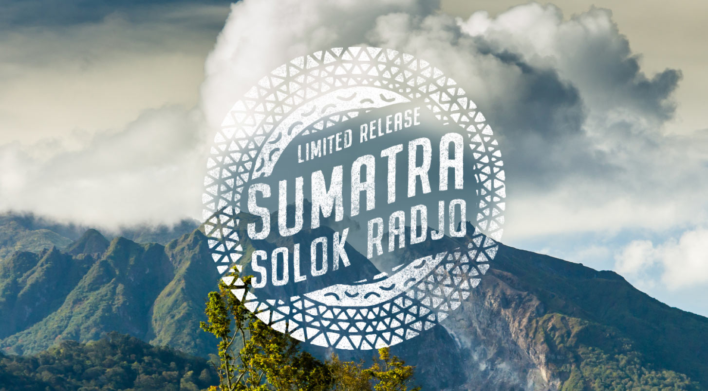 Peet's Sumatra Solok Radjo coffee logo in front of green mountains